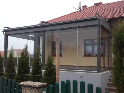 Sommergarten mit Raffstore und Dachmarkise